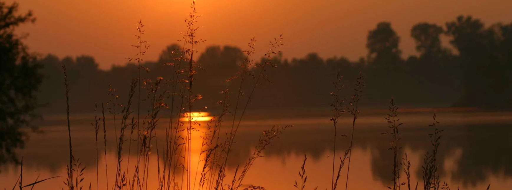 Badesee im Sonnenuntergang
